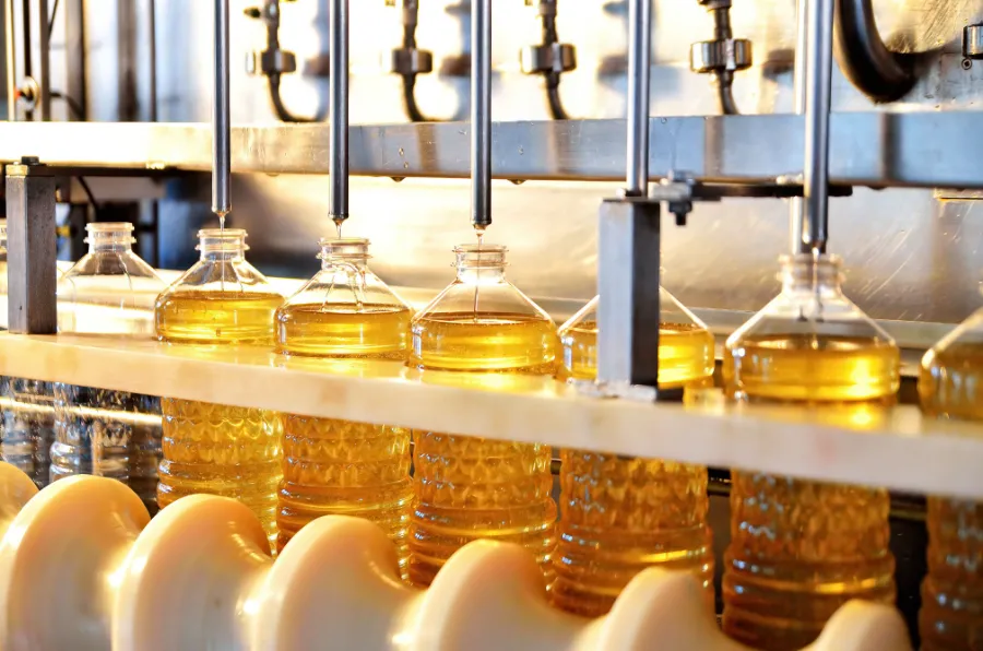 Ligne de conditionnement d'huile alimentaire en bouteilles